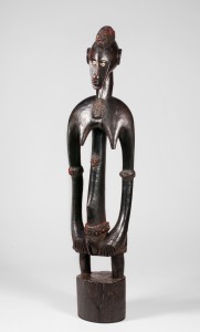 Female figure. Unidentified artist. Wood, cowrie shells, abrus seeds, latex; h. 90.5 cm. Private Collection. BAMW Photography